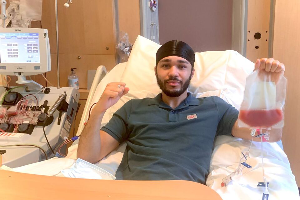 Photo of Ezra donating his stem cells. He's also shared his story.