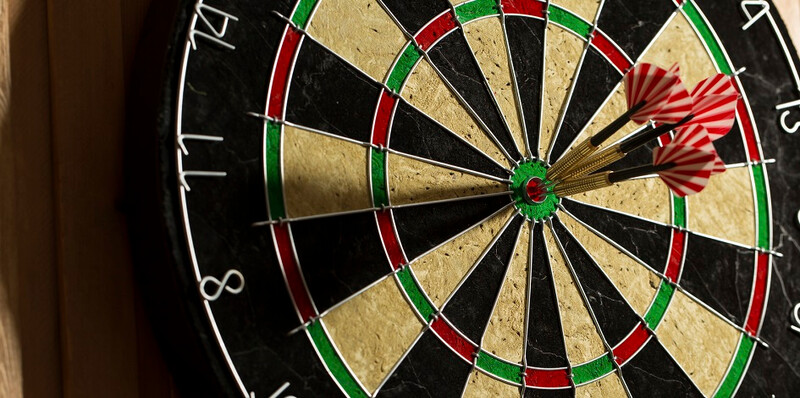 Darts-grouped-in-bullseye945x470