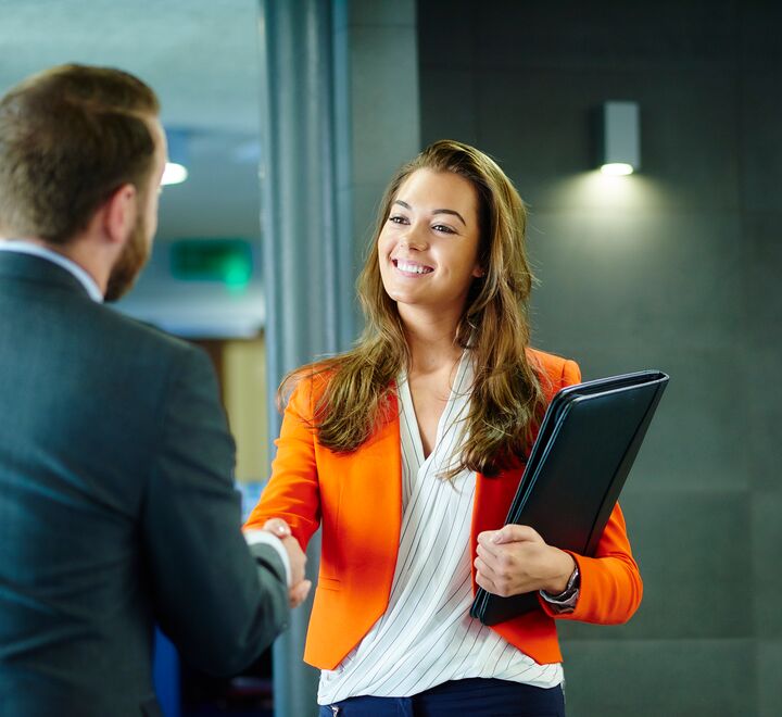Woman smiling in a job interview