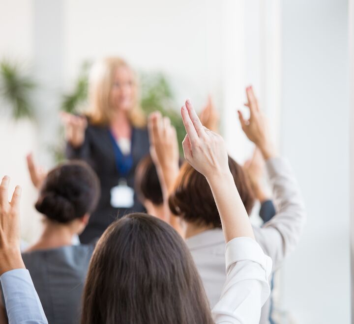 People raising their hands
