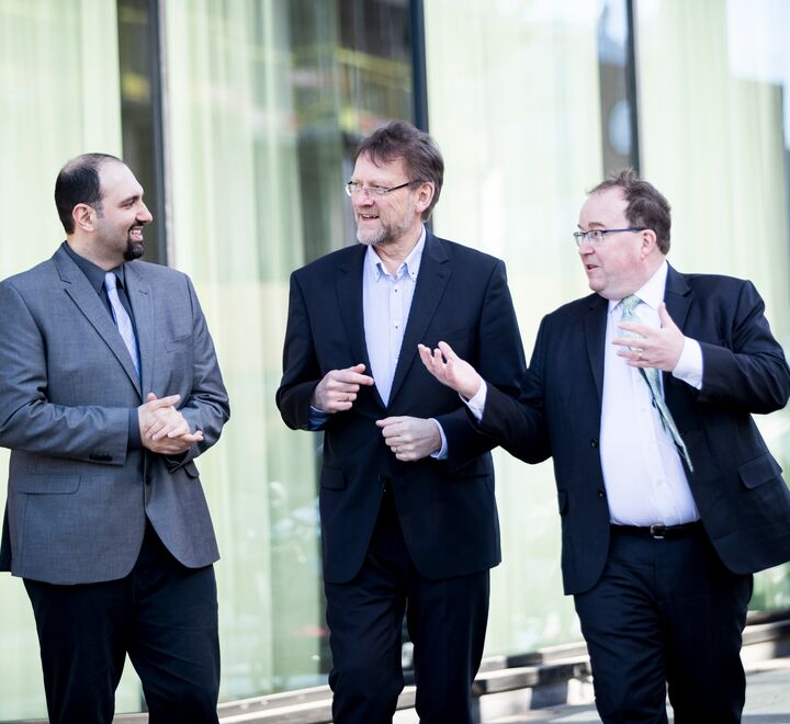 Group photo of Jon Lereim, Dr. Maxime Schenckery and Arash Farnoosh