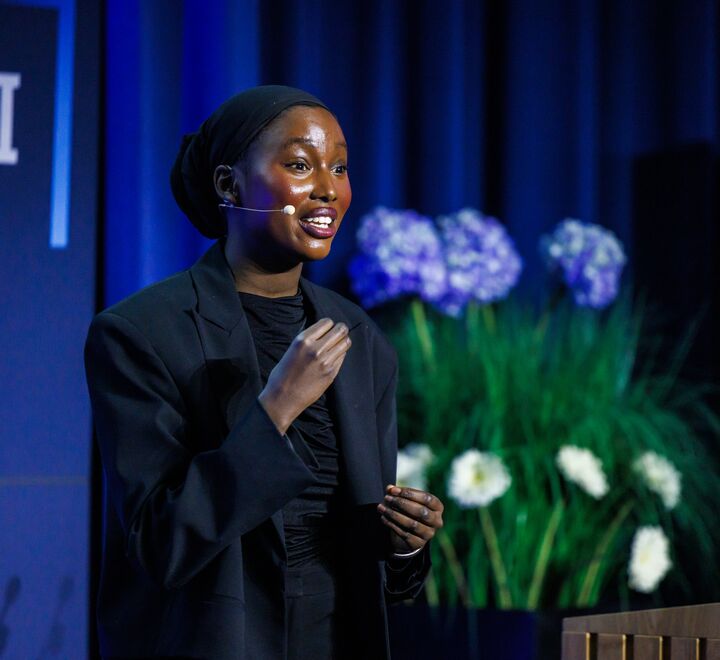 The final of BIICC 2025. A female student presenting.