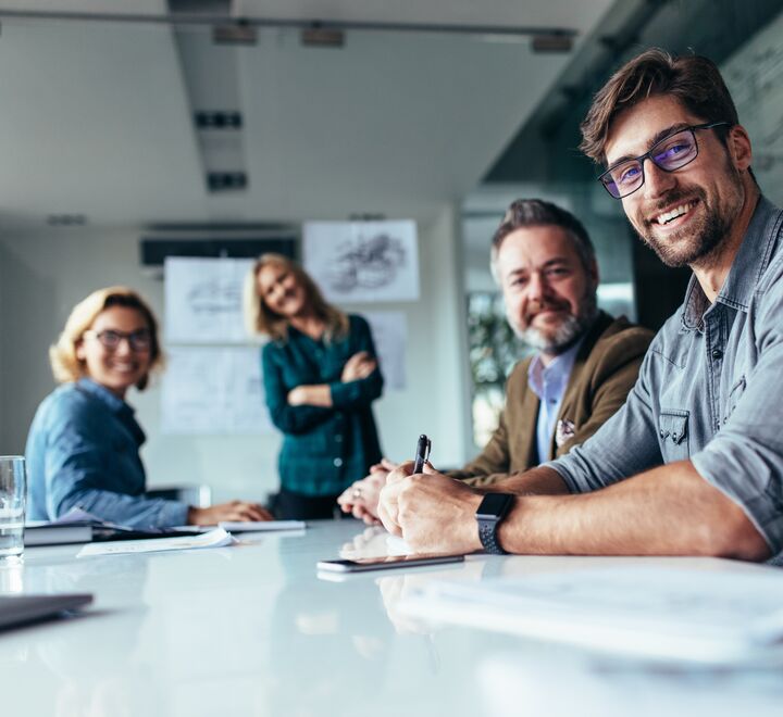 Smiling people in a business meeting