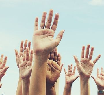 People raising hands