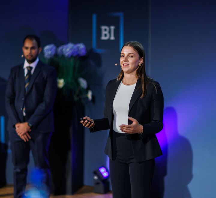 BIICC 2025. A female student presenting.