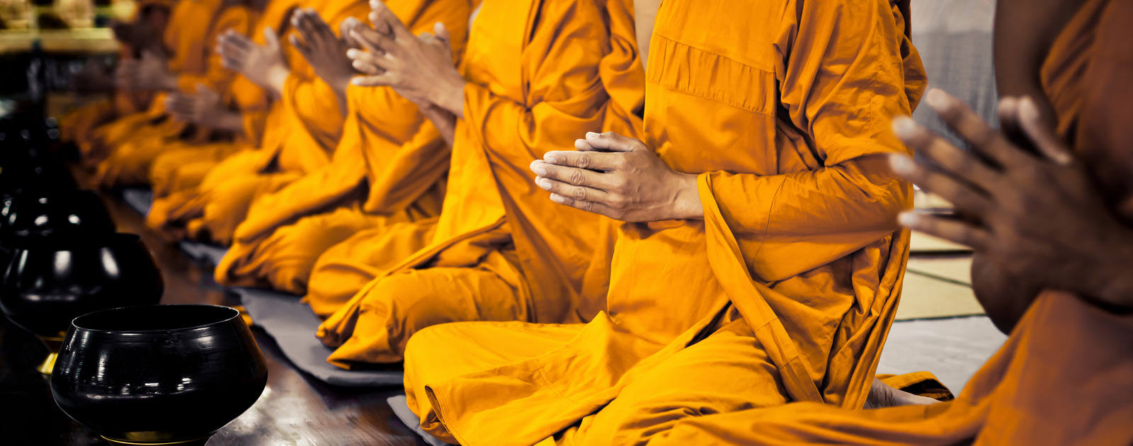 Belief and Beyond Belief: Buddhist monks praying Buddhist monks praying
