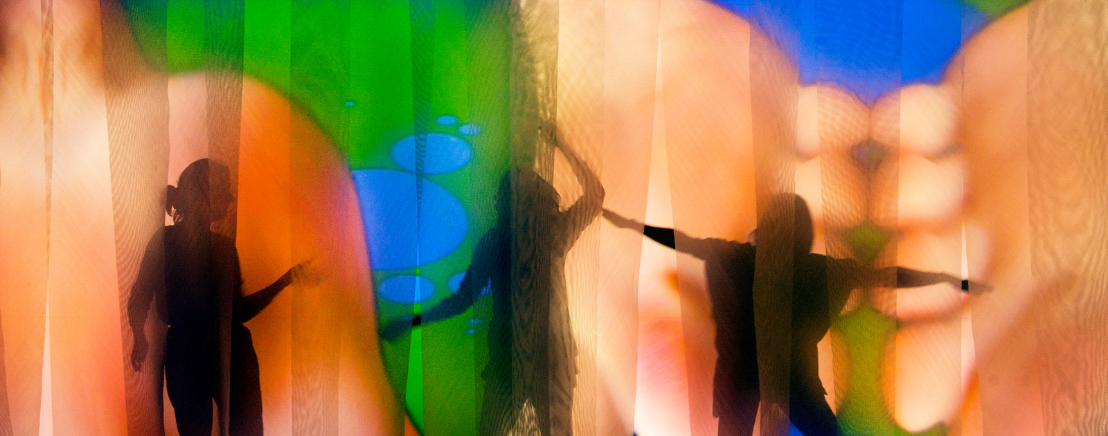 Lobe Of The Lung, 2009 by PIPILOTTI RIST: EYEBALL MASSAGE Exhibition Hayward Gallery 2011 Figures Dancing behind Curtains with Projection by artist, Pipilotti Rist at Hayward Gallery