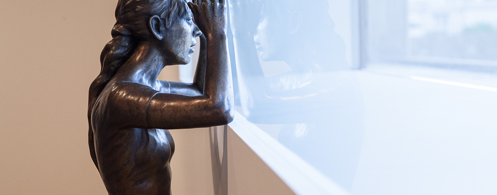 Come up on different streets, they both were streets of shame Or Absinth blurs my thoughts, I think we should be moving on by Ryan Gander at The Human Factor Exhibition, Hayward Gallery 2014 Bronze Figure Looking out of Window by artist, Ryan Gander at Hayward Gallery