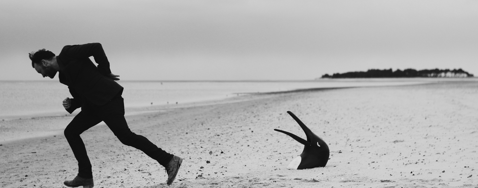 Penguin Cafe + Peter Broderick & friends Man on a Beach with Penguin Head
