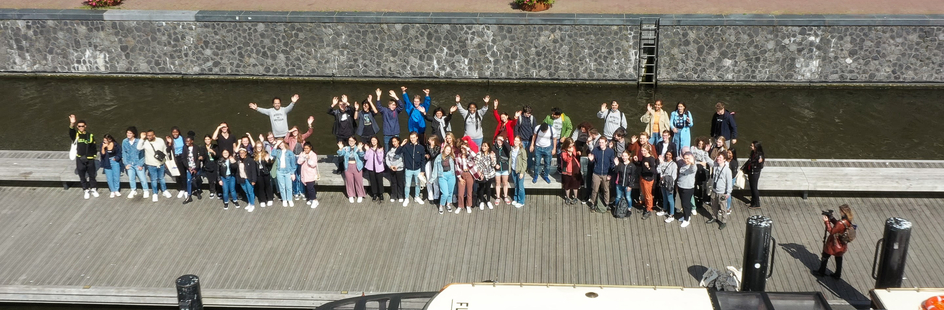 Students and a boat