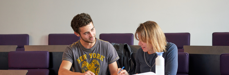 Two guys studying together