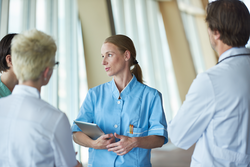 group of medical staff at hospital, doctors team standing together