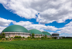 Anaerobic digesters or Biogas plant producing biogas from agricultural waste in rural Germany. Modern Biofuel Industry concept