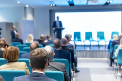 Business conference and presentation or international political event. Public speaking concept.