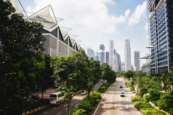Green city of the future. City of the future. Harmony of city and nature. Sunny day in the big city. Deserted quarter, streets without people