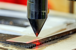 Red laser on cutting machine in physics laboratory; Shutterstock ID 299331491; purchase_order: Bynder Library; job: ; client: ; other: