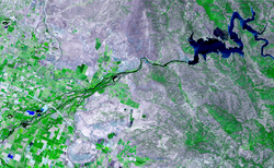 Satellite images in false-color compositions showing crops between the ash and wood boundaries California USA.