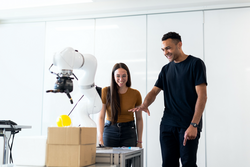 Engineers work with medical robotic equipment