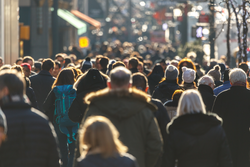 Crowd of people walking on a street in New York City 